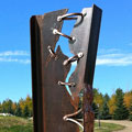 Infrastructure III. 2010, 106 x 20 x 6 inches on a 30 inch diameter base - steel, copper, tung oil, 500lbs. Photo: M. Craig Campbell